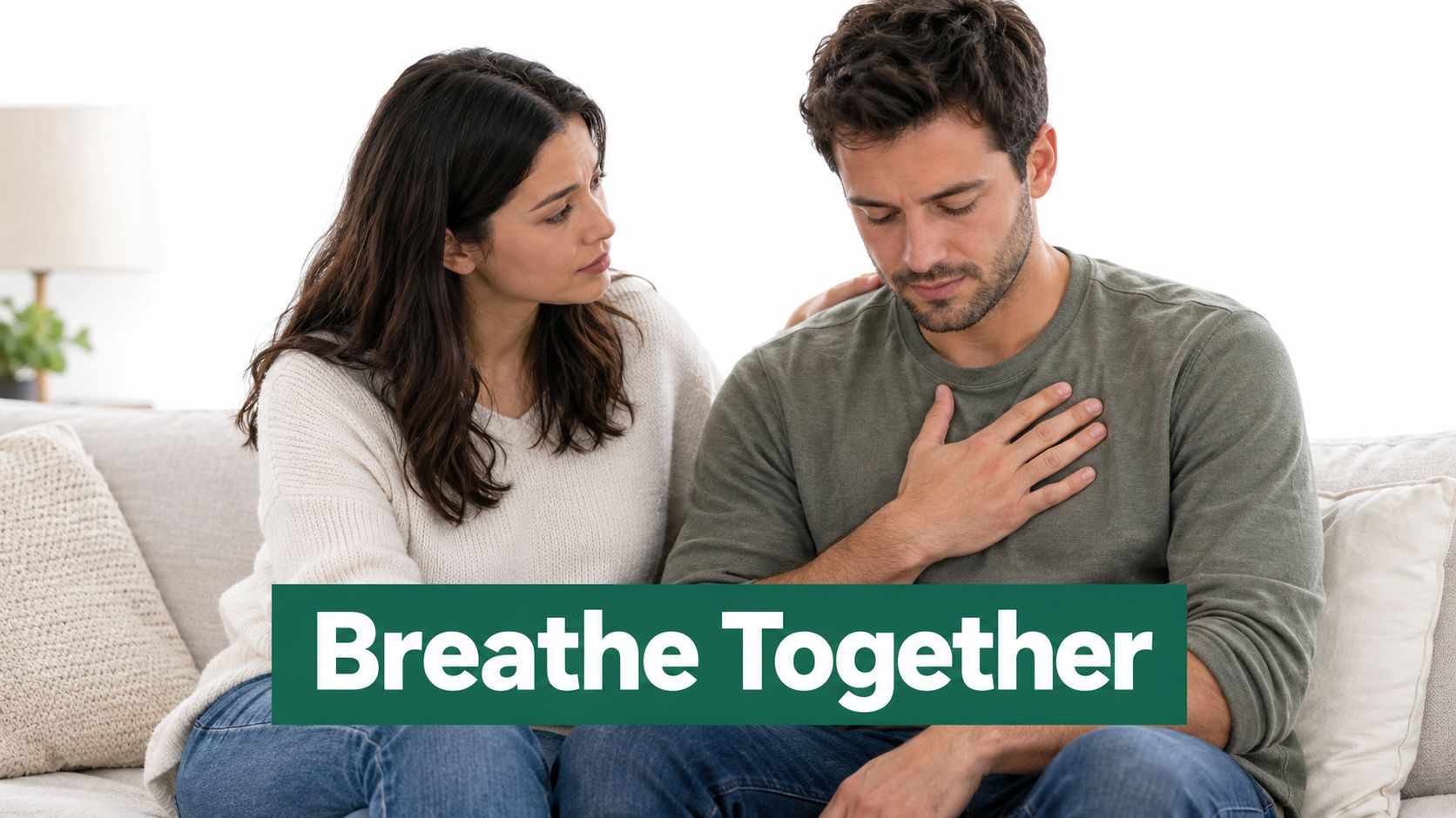 A woman offering support to her anxious partner who is holding his chest while breathing deeply.