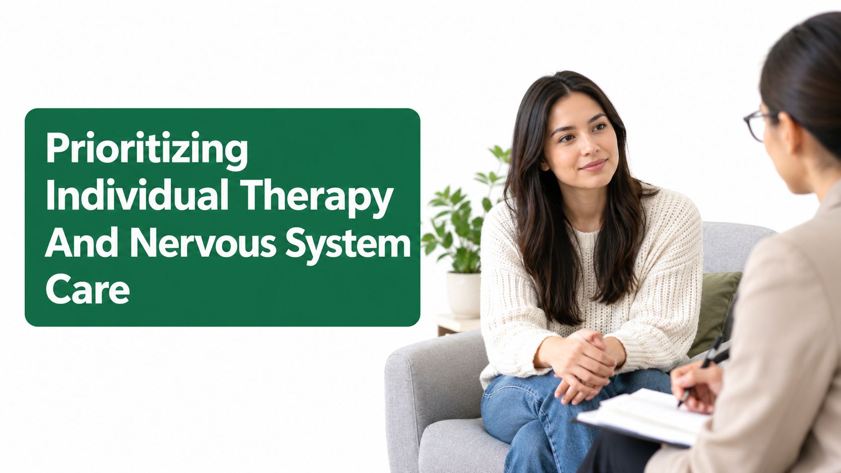 A female client sits in a comfortable chair during a therapy session with a professional counselor.