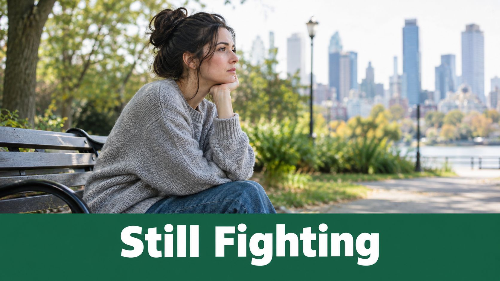 A contemplative woman sitting on a park bench overlooking a city skyline, representing emotional struggle.