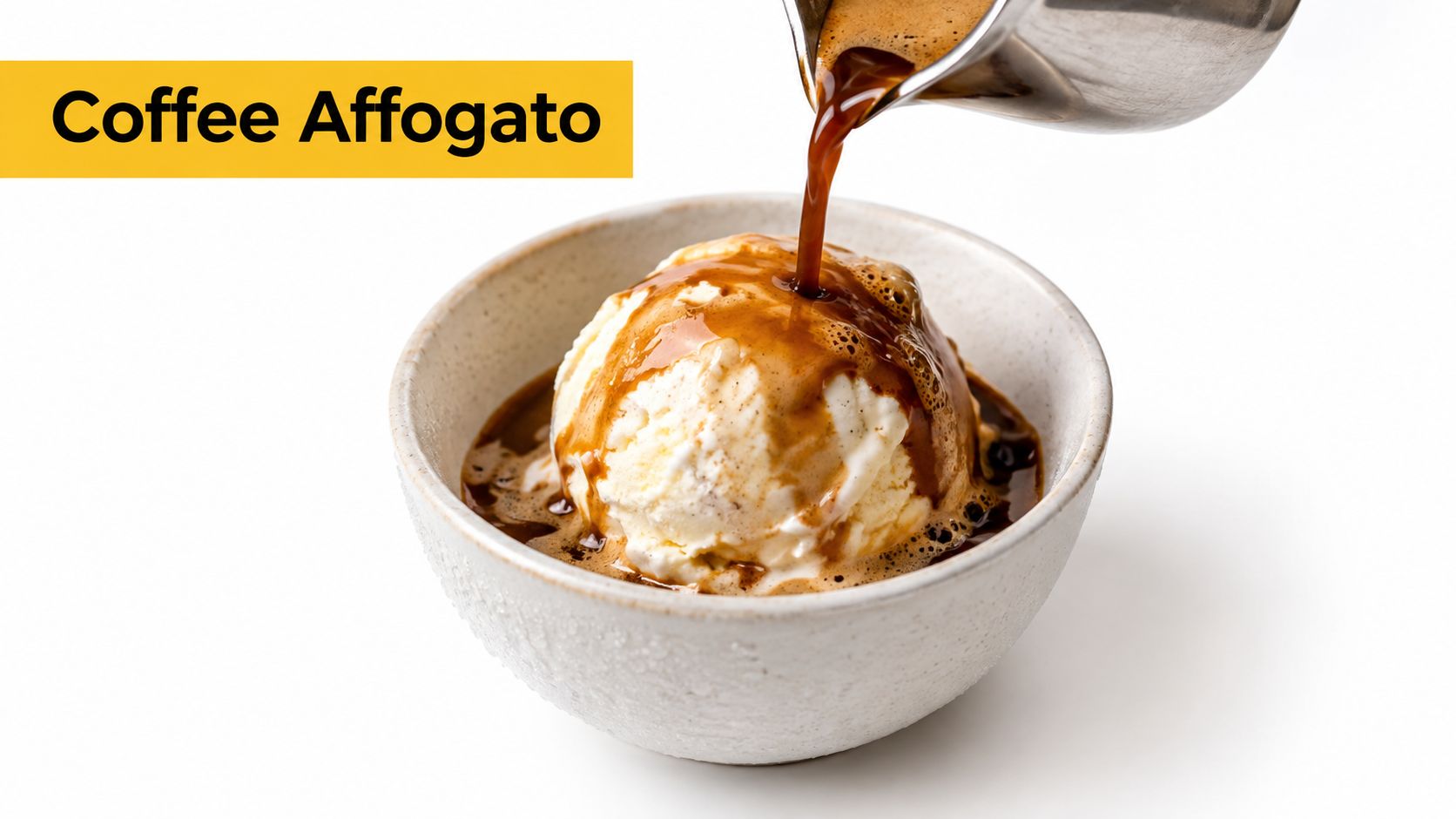 A scoop of vanilla ice cream in a small bowl being drizzled with hot dark coffee.