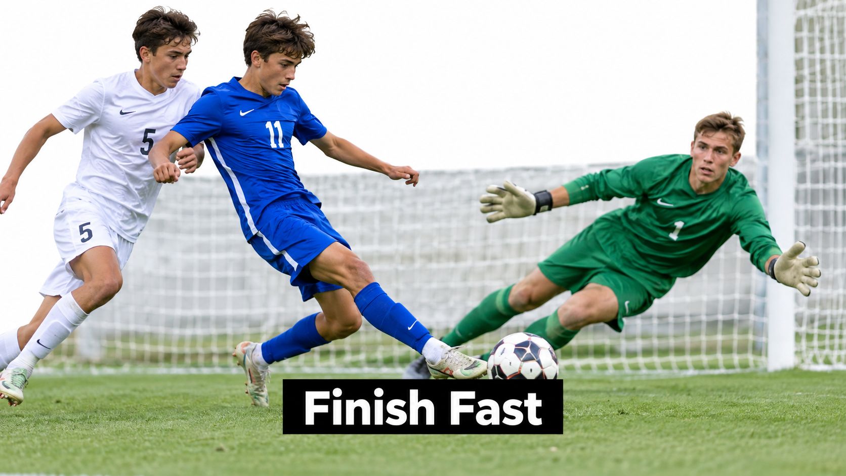 A soccer player in a blue uniform takes a shot on goal against a goalkeeper in green.