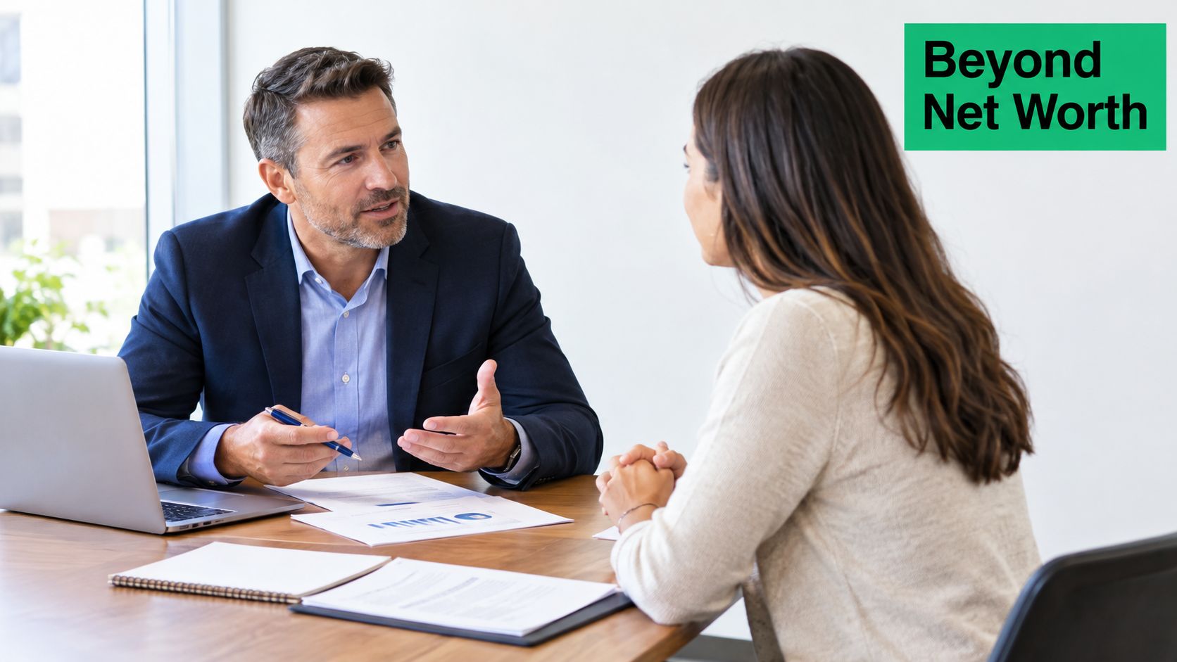 A professional financial advisor talking with a client in a modern office meeting about business investment strategies.