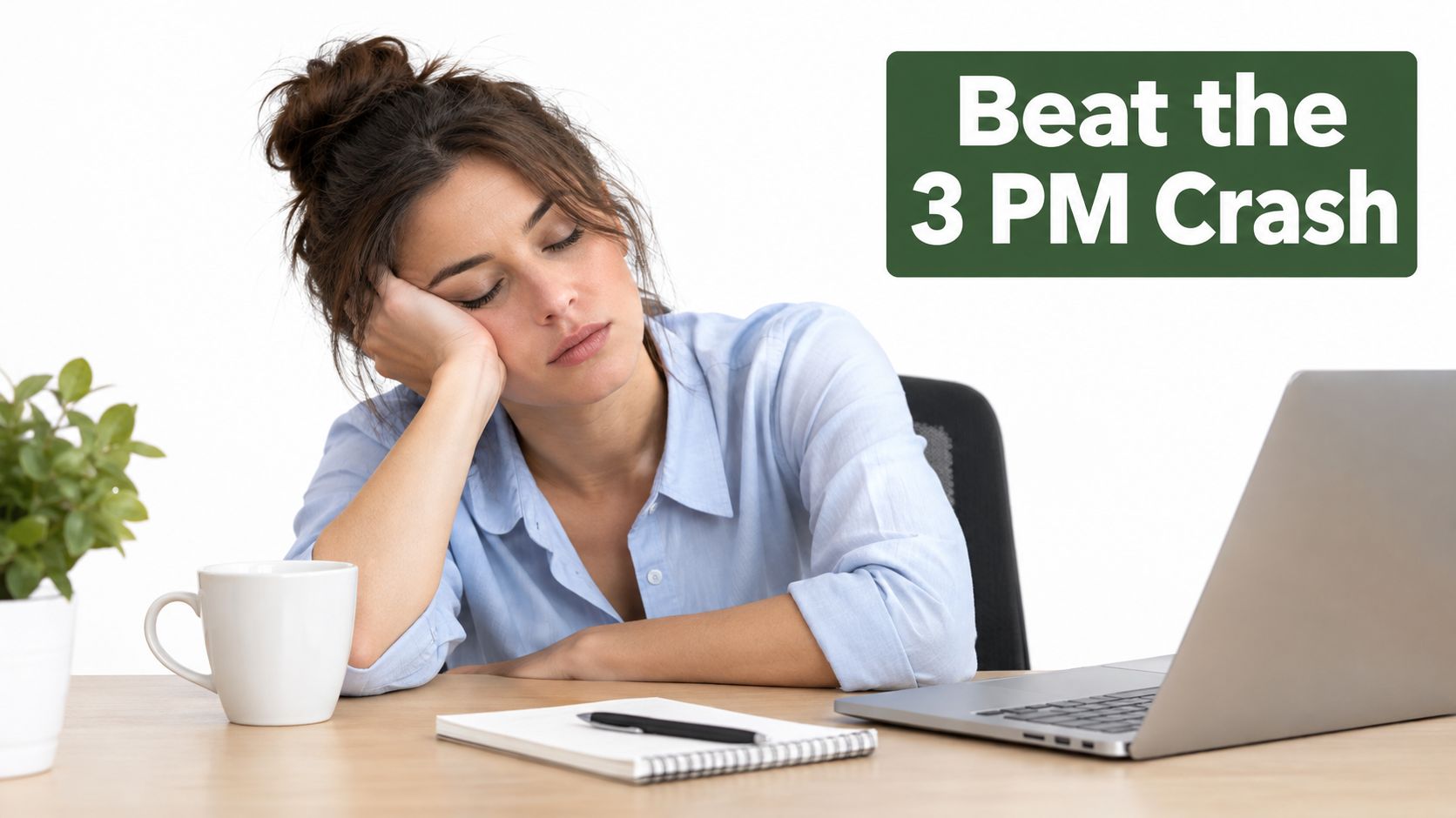 A tired woman resting her head on her hand at a desk with a laptop and coffee.