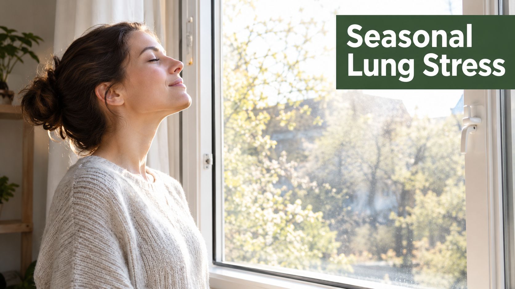 A woman with her eyes closed stands by a bright window, breathing deeply to relieve seasonal lung stress.