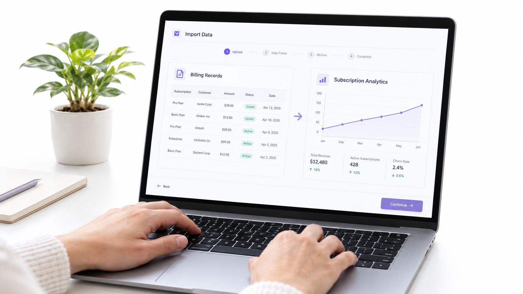 A person working on a laptop displaying a software interface with billing records and subscription analytics charts.