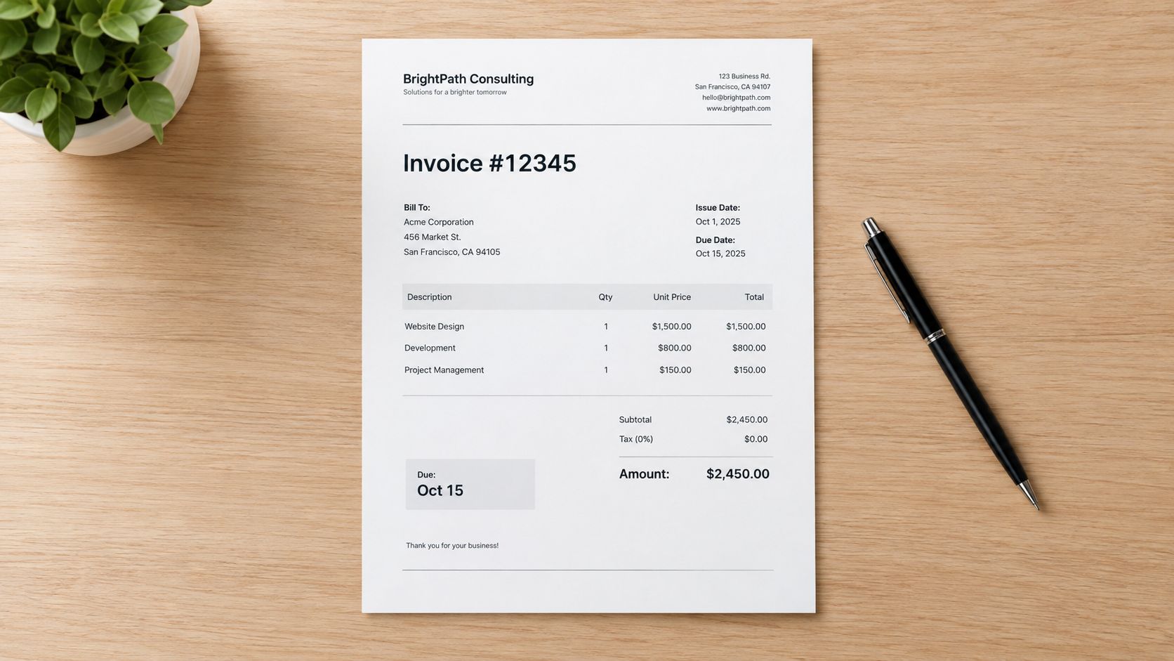 A professional invoice document from BrightPath Consulting resting on a wooden desk with a black pen.