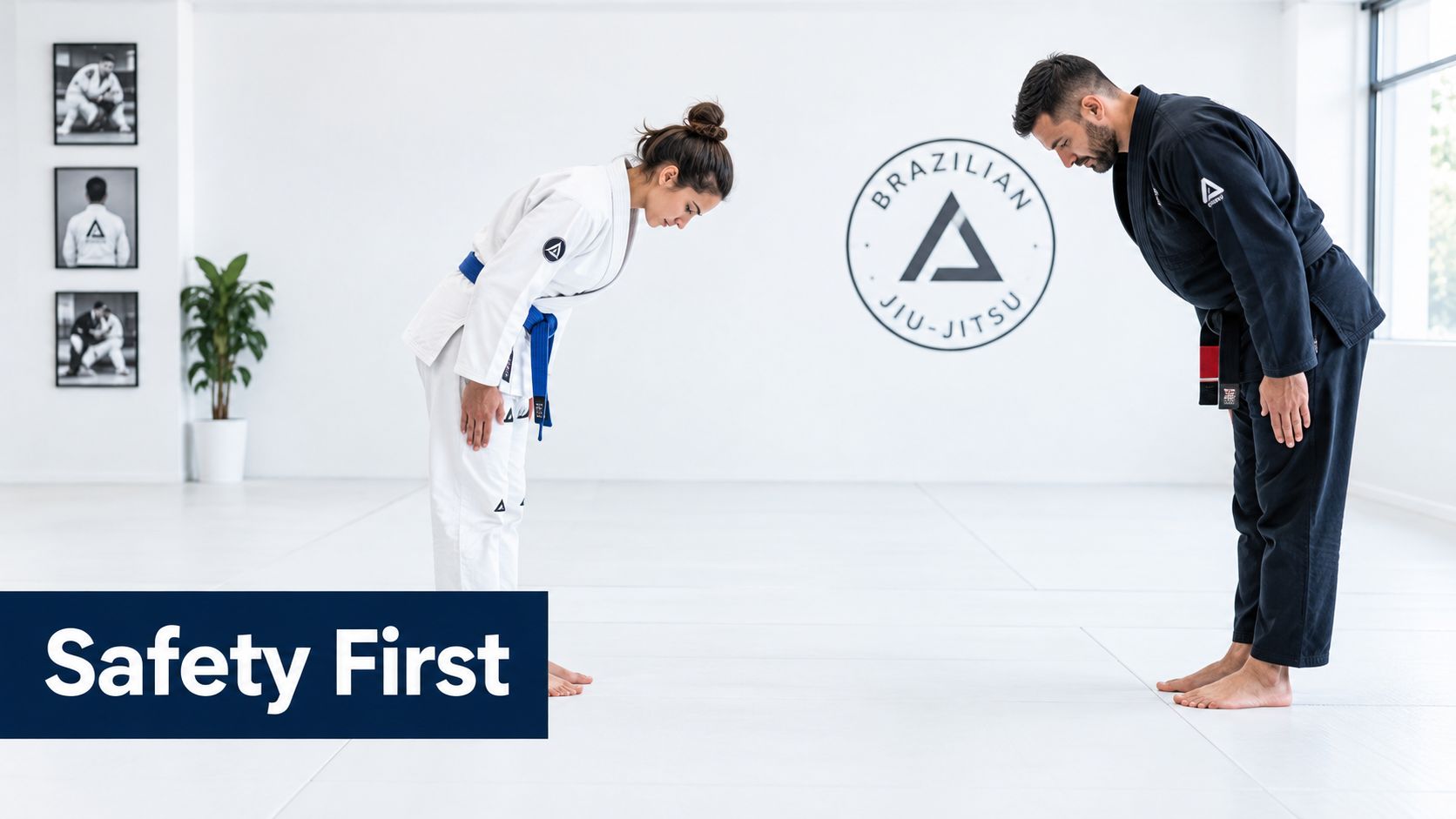 A male instructor and female student bowing to each other on the mats in a jiu-jitsu gym.