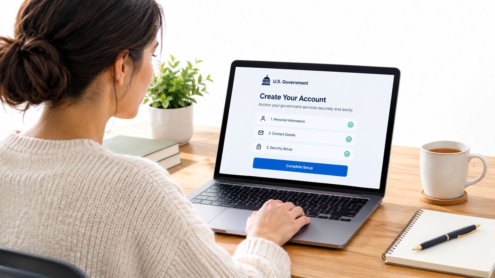 A woman using a laptop to create an online U.S. government account for public services at home.