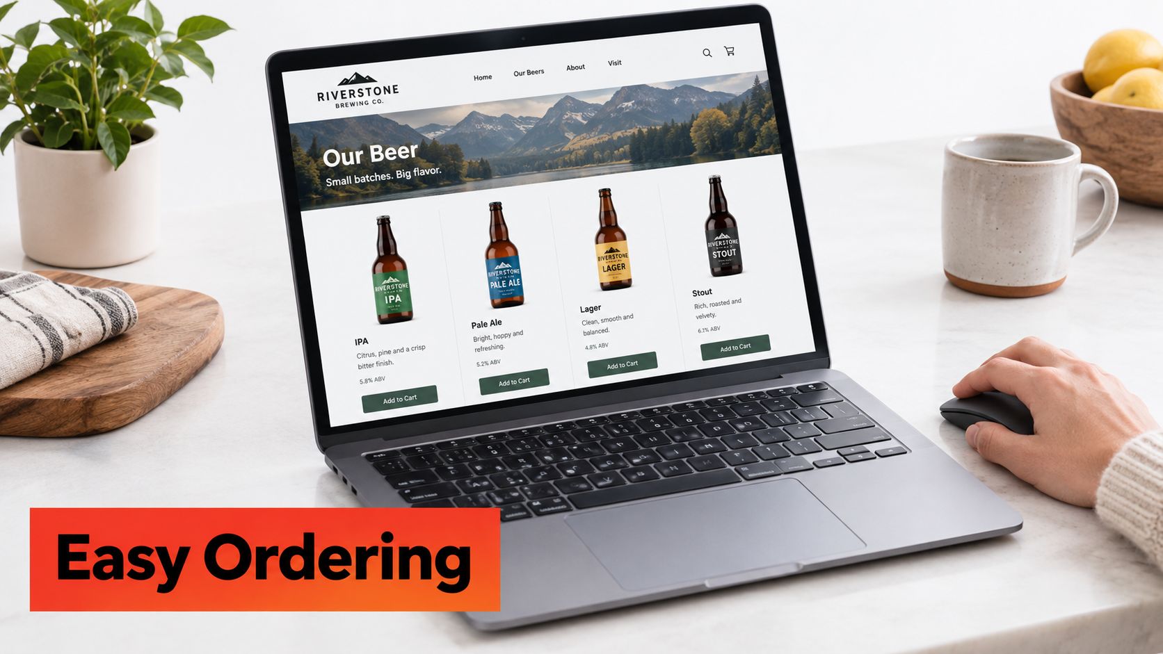 A person using a laptop to view the Riverstone Brewing Co website for online beer ordering.