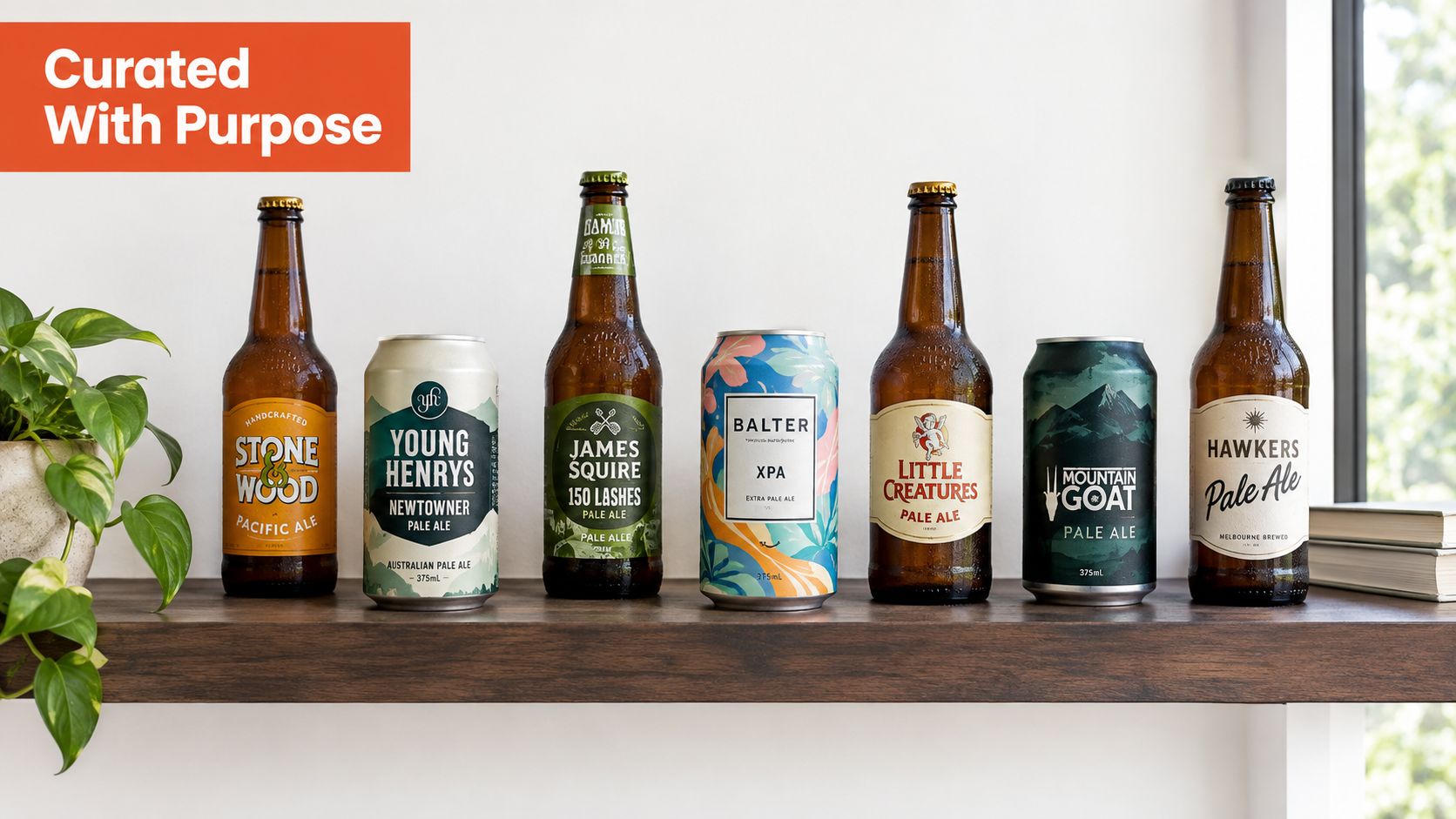 A row of various Australian craft beer bottles and cans arranged on a wooden shelf indoors.