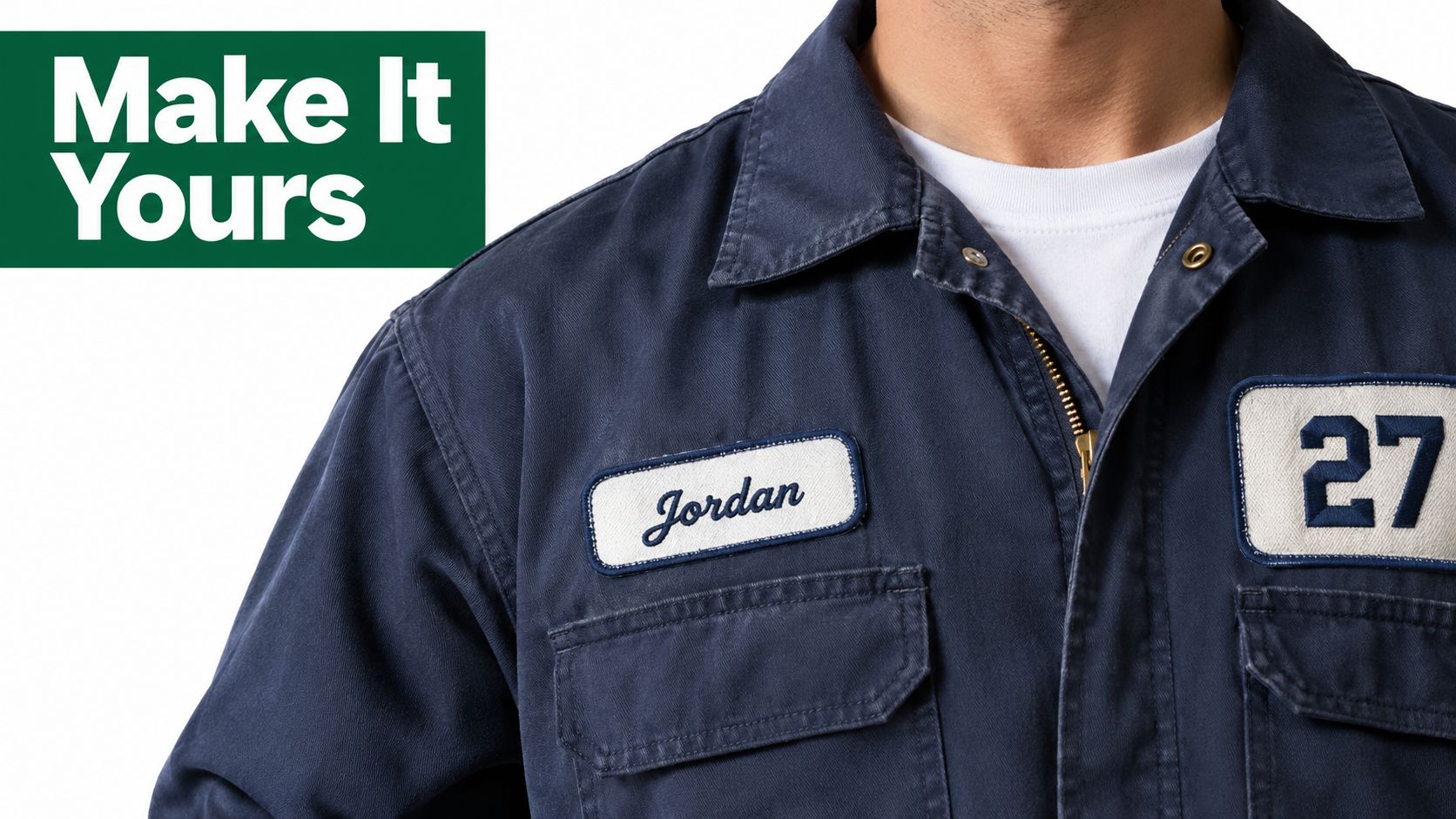 A close-up view of a person wearing navy blue work coveralls with a Jordan name tag patch.