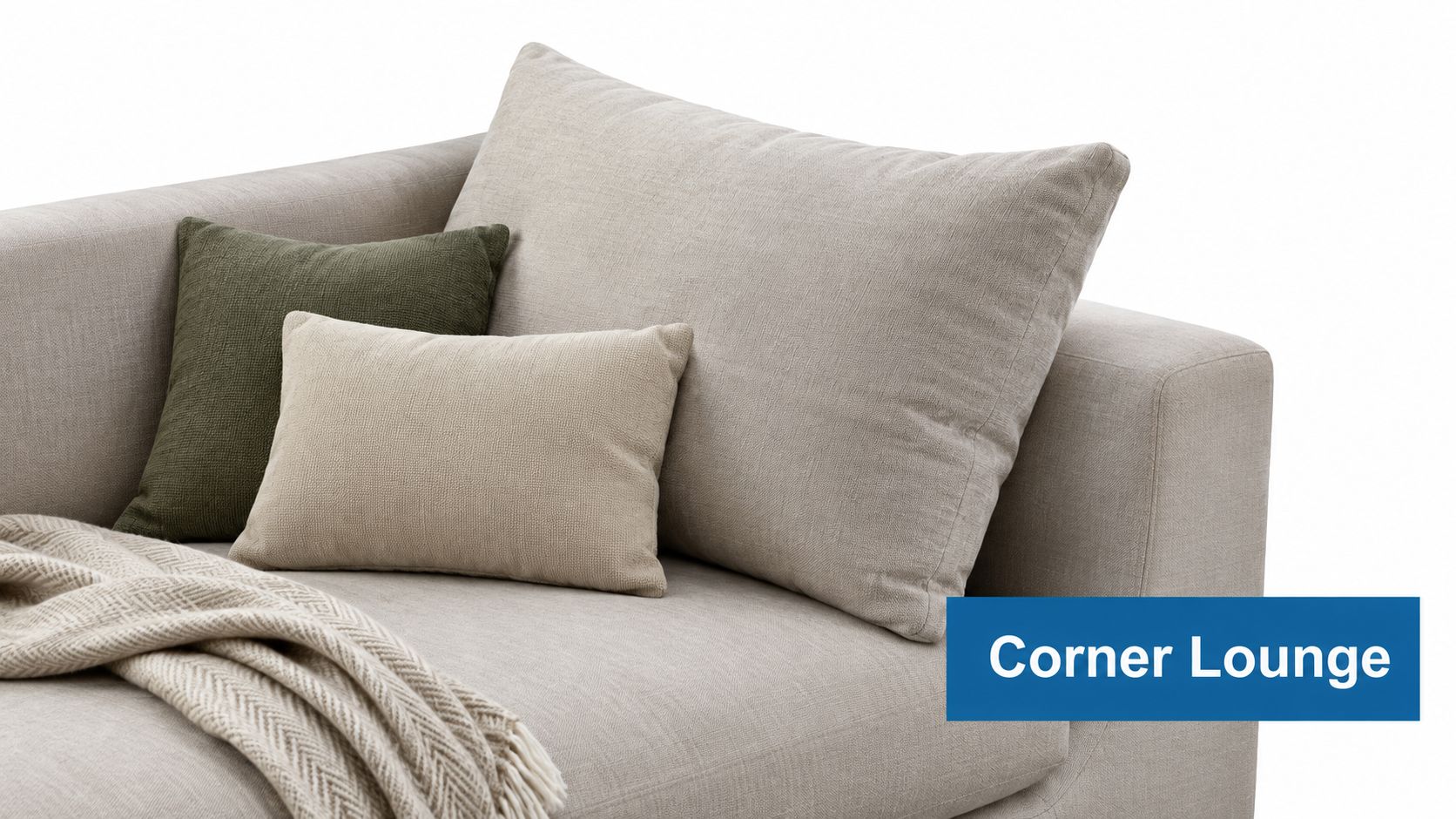 A comfortable light beige sofa decorated with two accent cushions and a textured throw blanket.