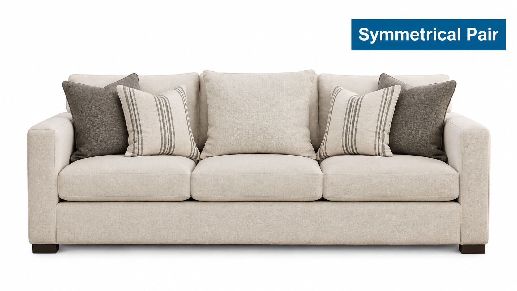 A neutral-toned three-seater sofa featuring a symmetrical arrangement of dark grey and striped accent pillows.