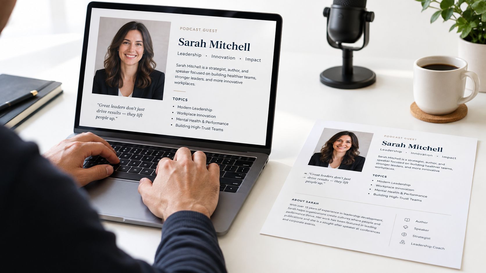 A person working on a laptop at a desk with a printed podcast guest one sheet document.
