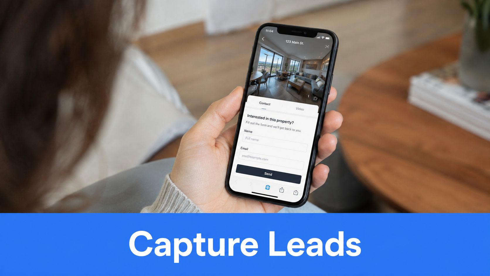 A person holding a smartphone displaying a lead capture form for a real estate property listing.