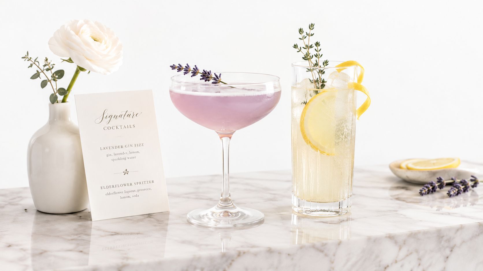 Two illustrated signature cocktails beside a printed wedding drink menu.