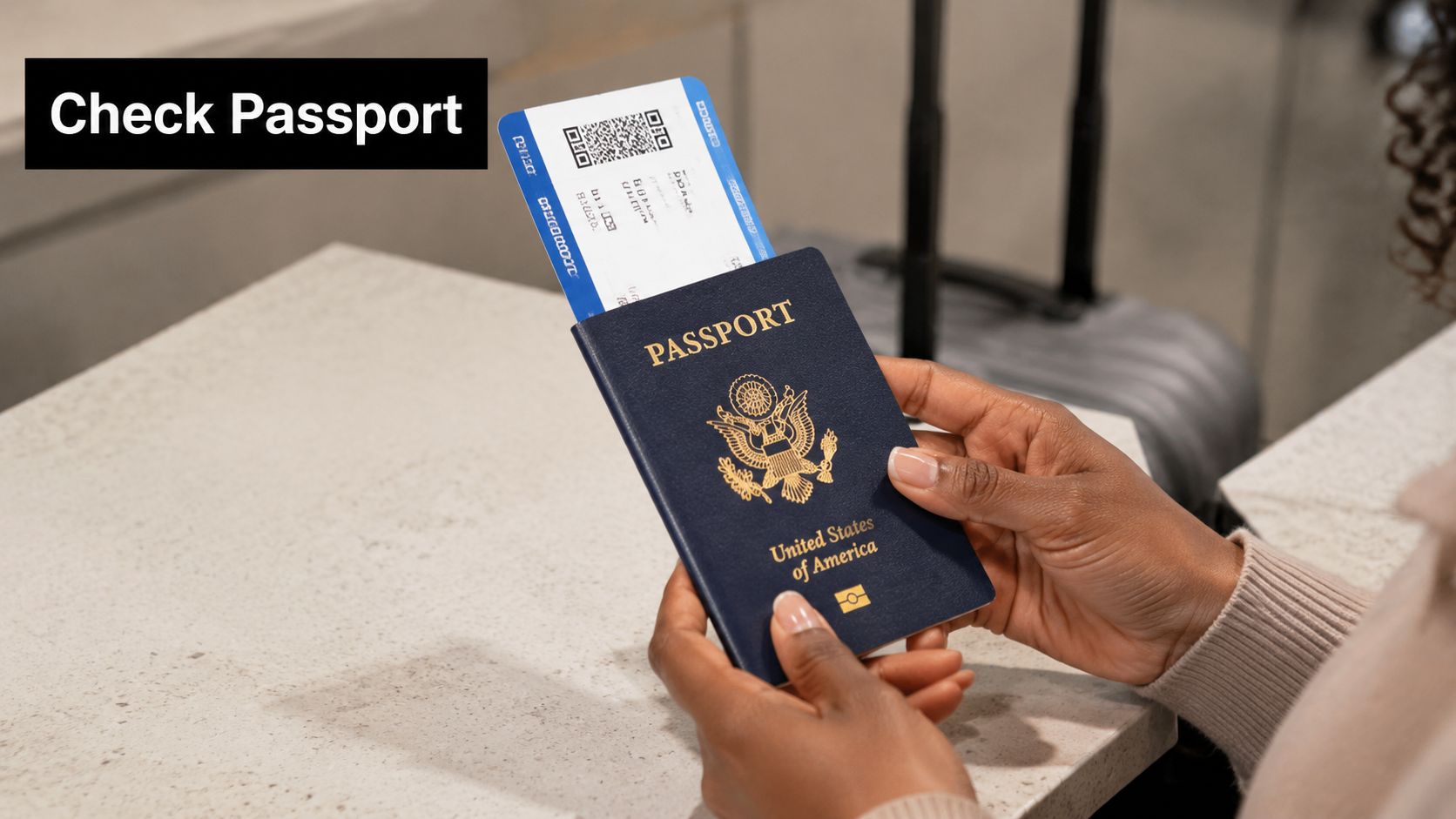 A person holding a United States passport and a boarding pass at an airport check-in counter.