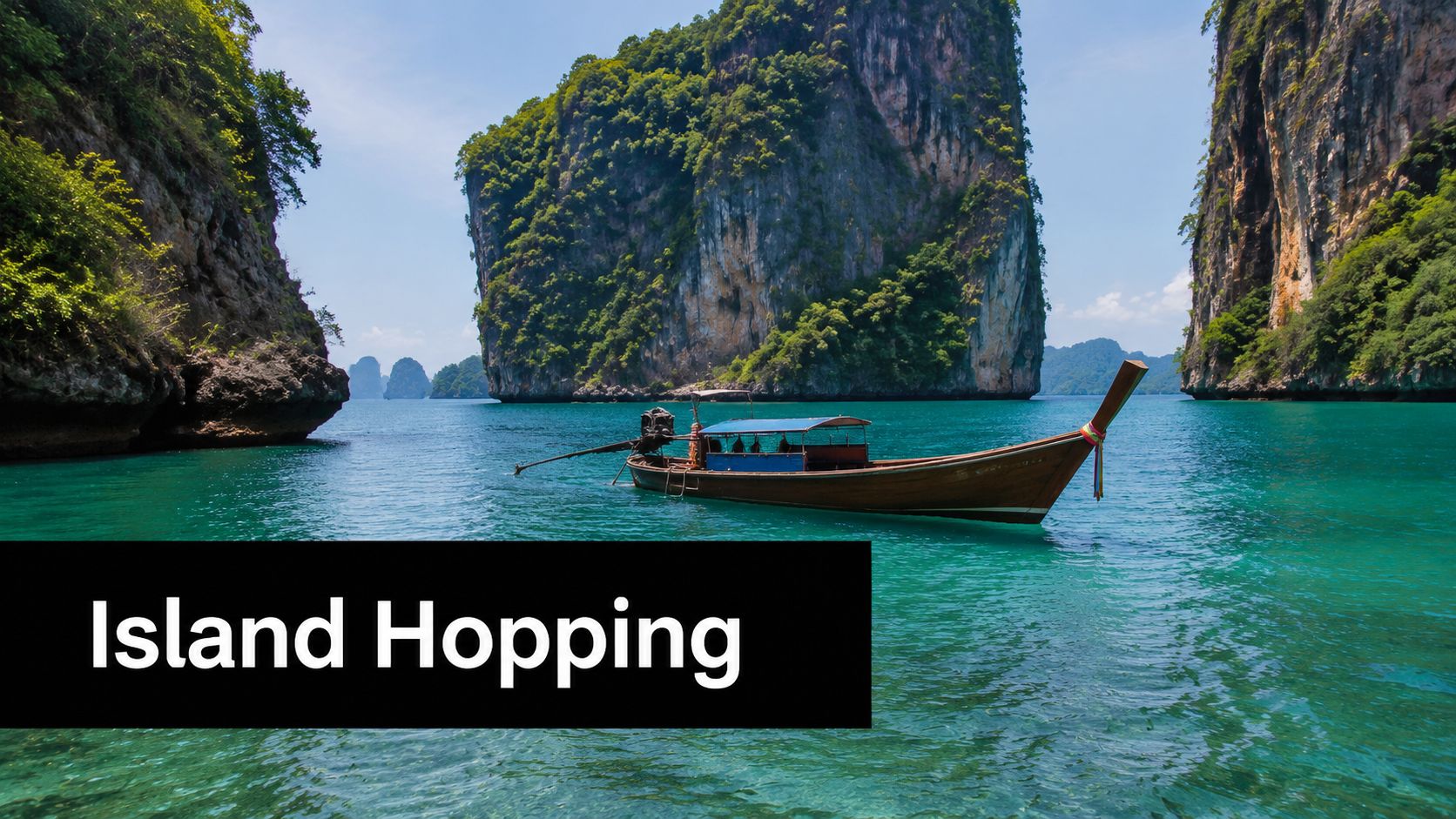 A traditional Thai long-tail boat anchored in emerald waters surrounded by tall limestone cliffs in Thailand.