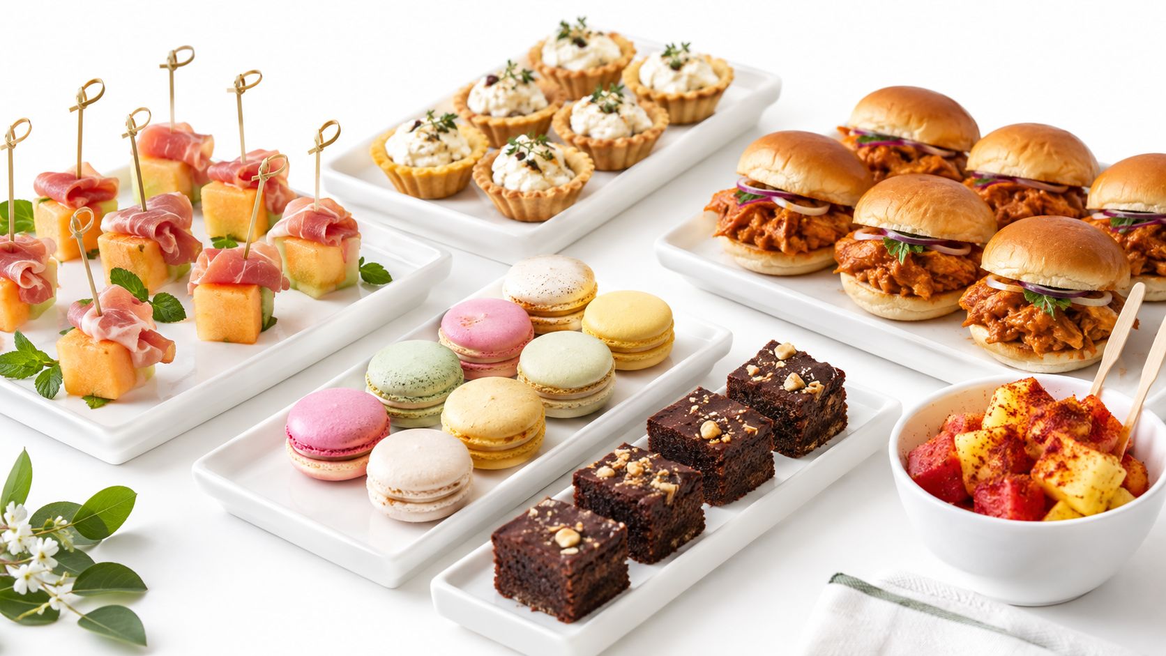 Una variedad de deliciosos bocadillos dulces y salados presentados cuidadosamente para una celebración o evento especial.