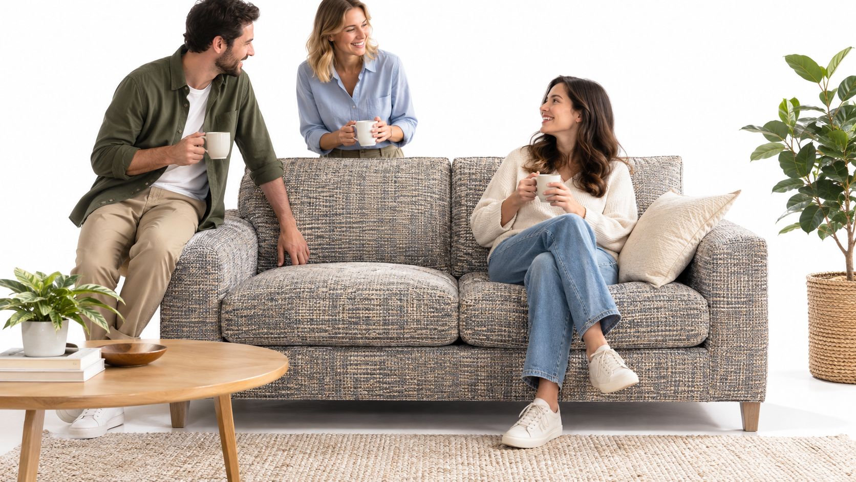 Three people relaxing together in a bright living room around a stylish patterned two seater sofa.