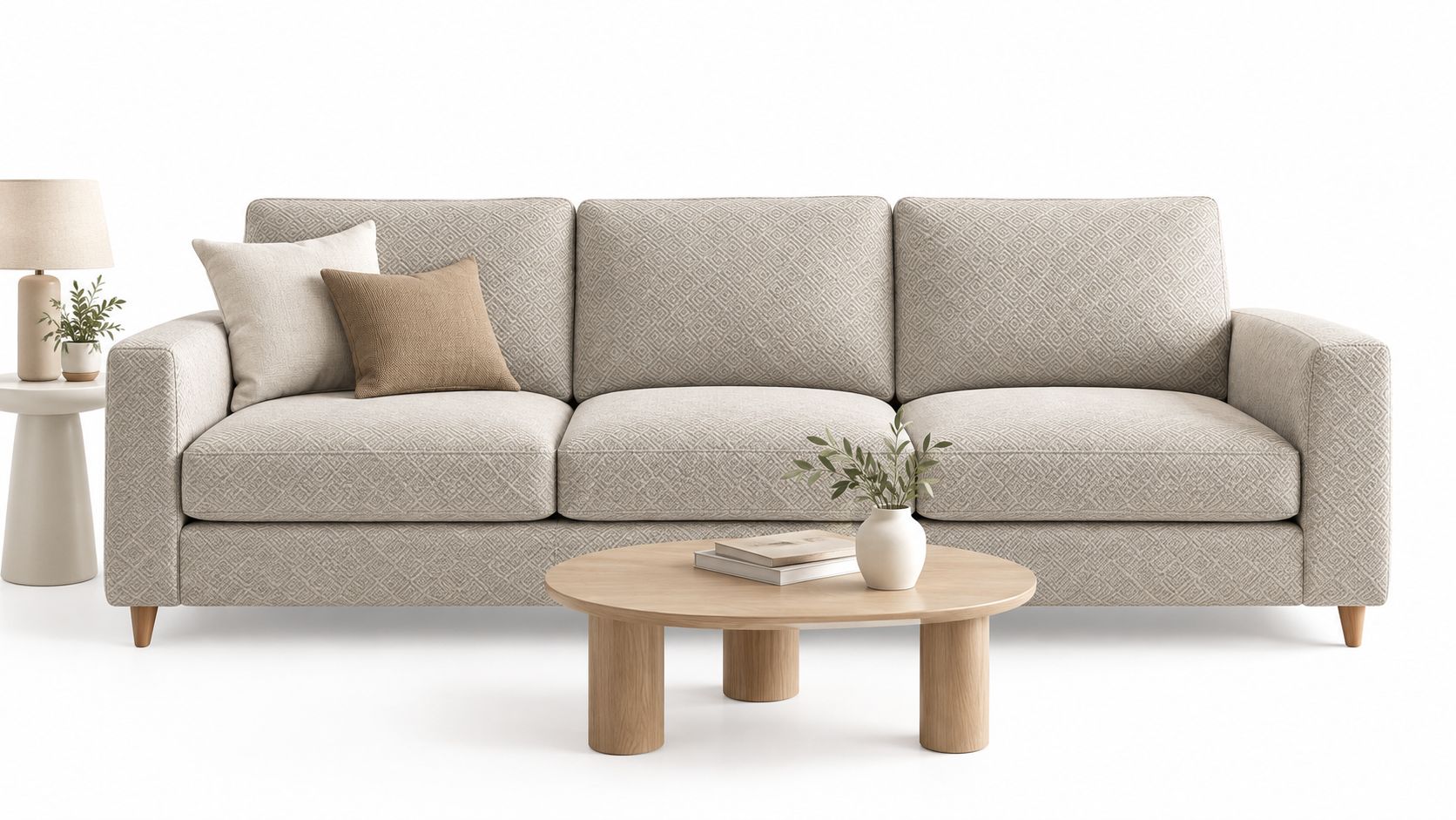 A minimalist living room setting featuring a beige herringbone pattern sofa with decorative cushions and wooden coffee table.
