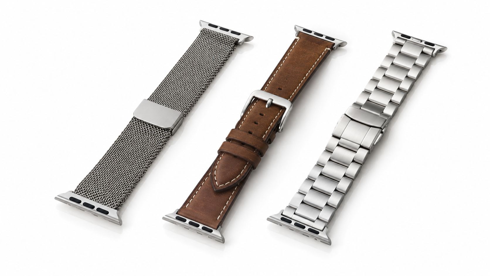 A high-angle view of three different styles of replacement watch bands for an Apple Watch device.