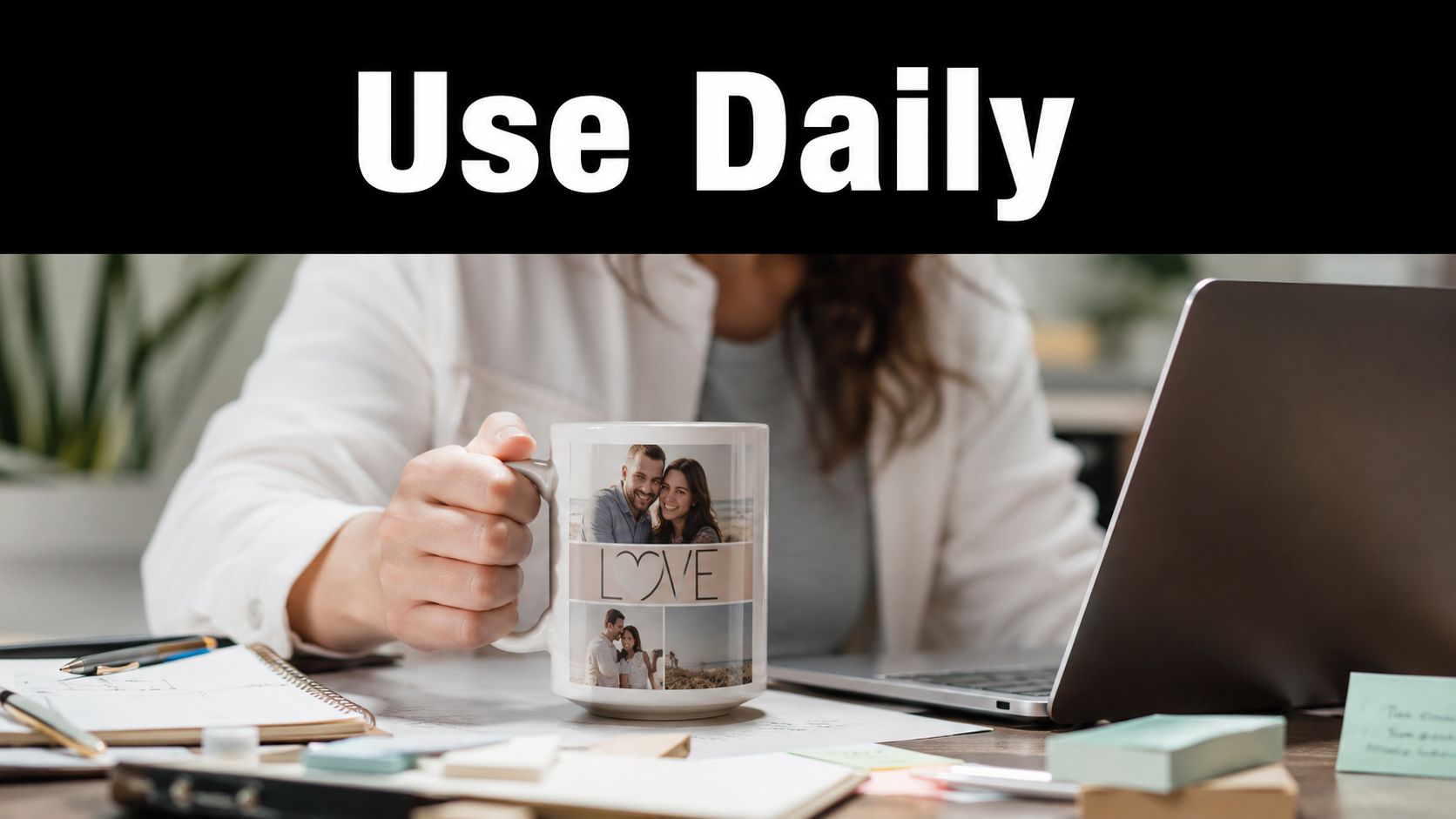 A person holds a custom photo mug featuring a couple's pictures while working at a desk.