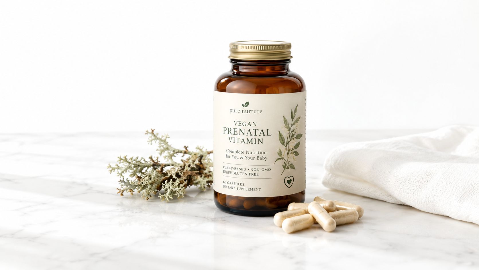 A glass bottle of pure nurture vegan prenatal vitamins on a marble surface with loose capsules.