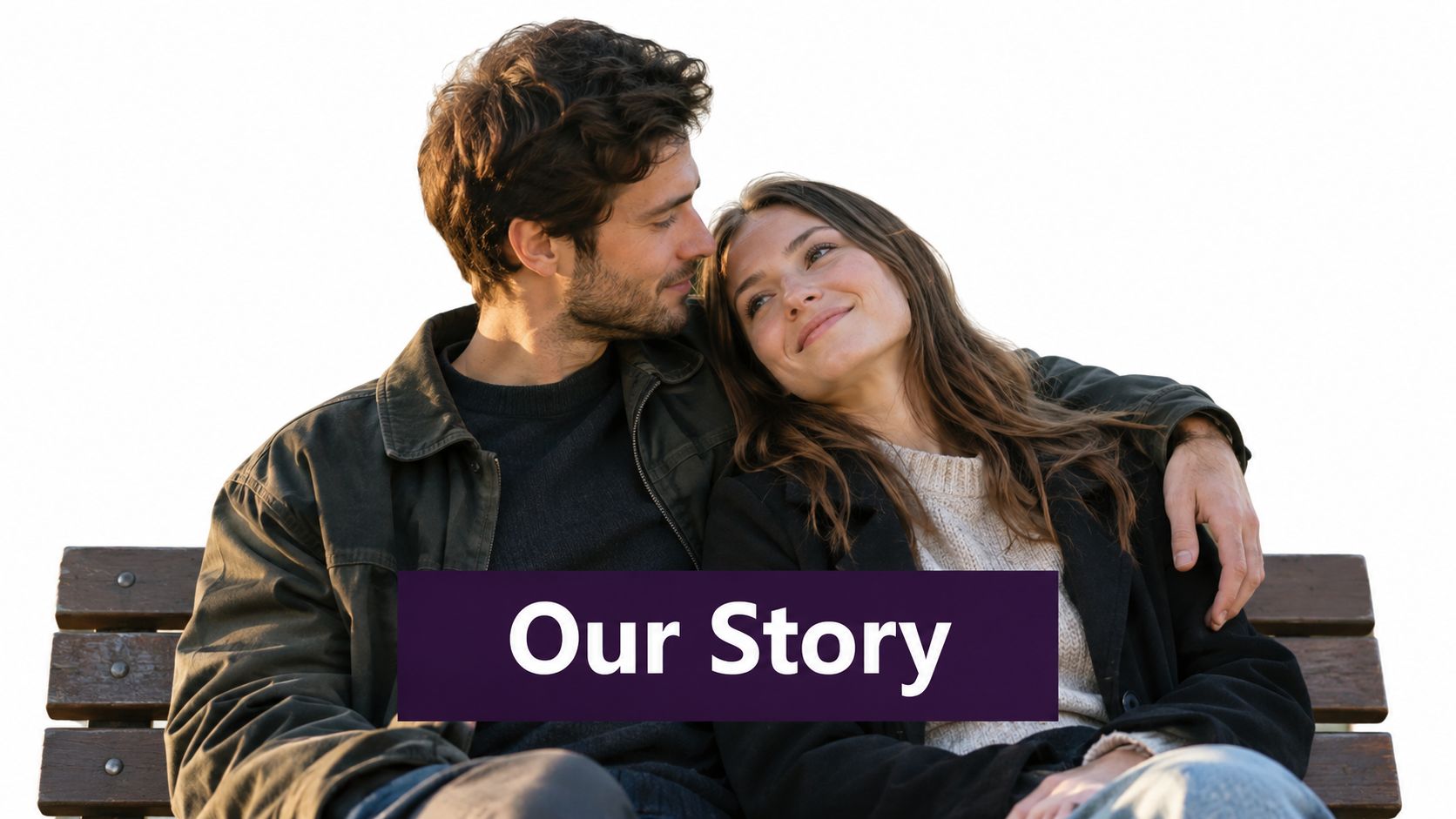 A happy young couple sitting closely together on a wooden park bench, looking at each other affectionately.