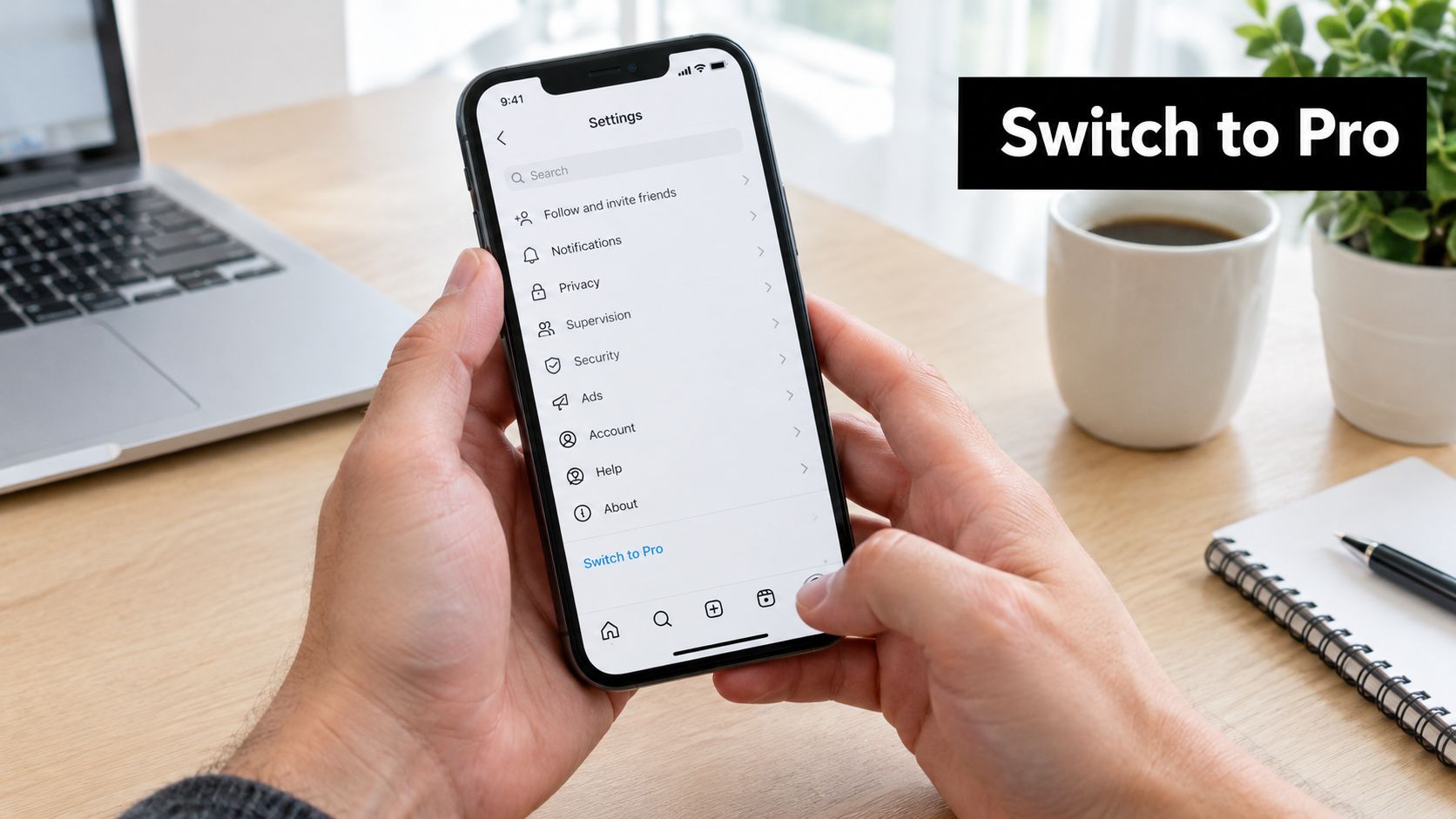 A person holding a smartphone showing Instagram settings with a prominent Switch to Pro menu option.