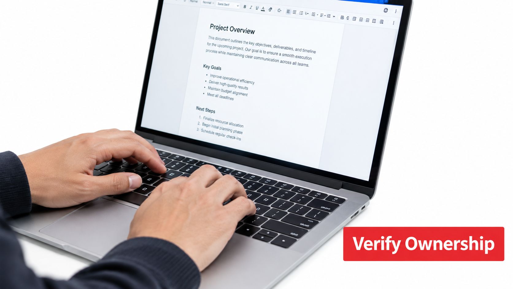 A person typing on a laptop computer displaying a professional project overview document on the screen.