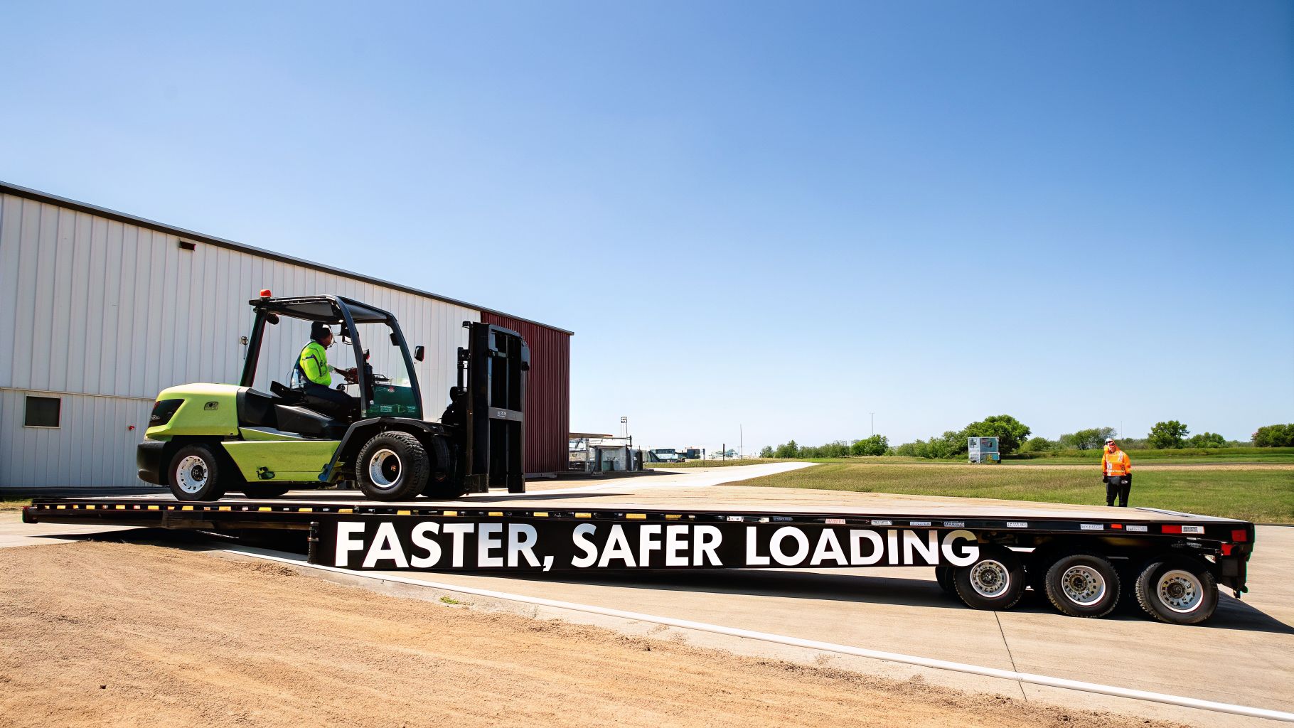 drop deck trailer specifications forklift loading A Guide to Drop Deck Trailer Specifications for 2026 On any busy jobsite, time is money. Every minute you spend wrestling with steep ramps or awkward tie-downs is a minute you're not earning. This is where certain drop deck trailer specifications stop being numbers on a page and start directly impacting your efficiency and, more importantly, your team's safety. The right features aren't just a luxury; they're essential for a profitable day's work. A forklift is driven onto a drop deck trailer featuring a 'Faster, Safer Loading' slogan, observed by a worker.