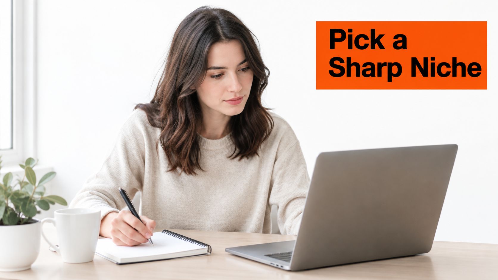 A woman working on her laptop and writing in a notebook while researching for her content.