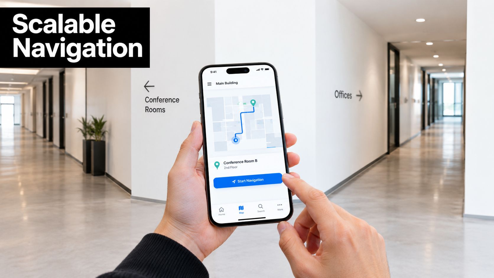 A person holding a smartphone showing an indoor building navigation app in a modern hallway setting.