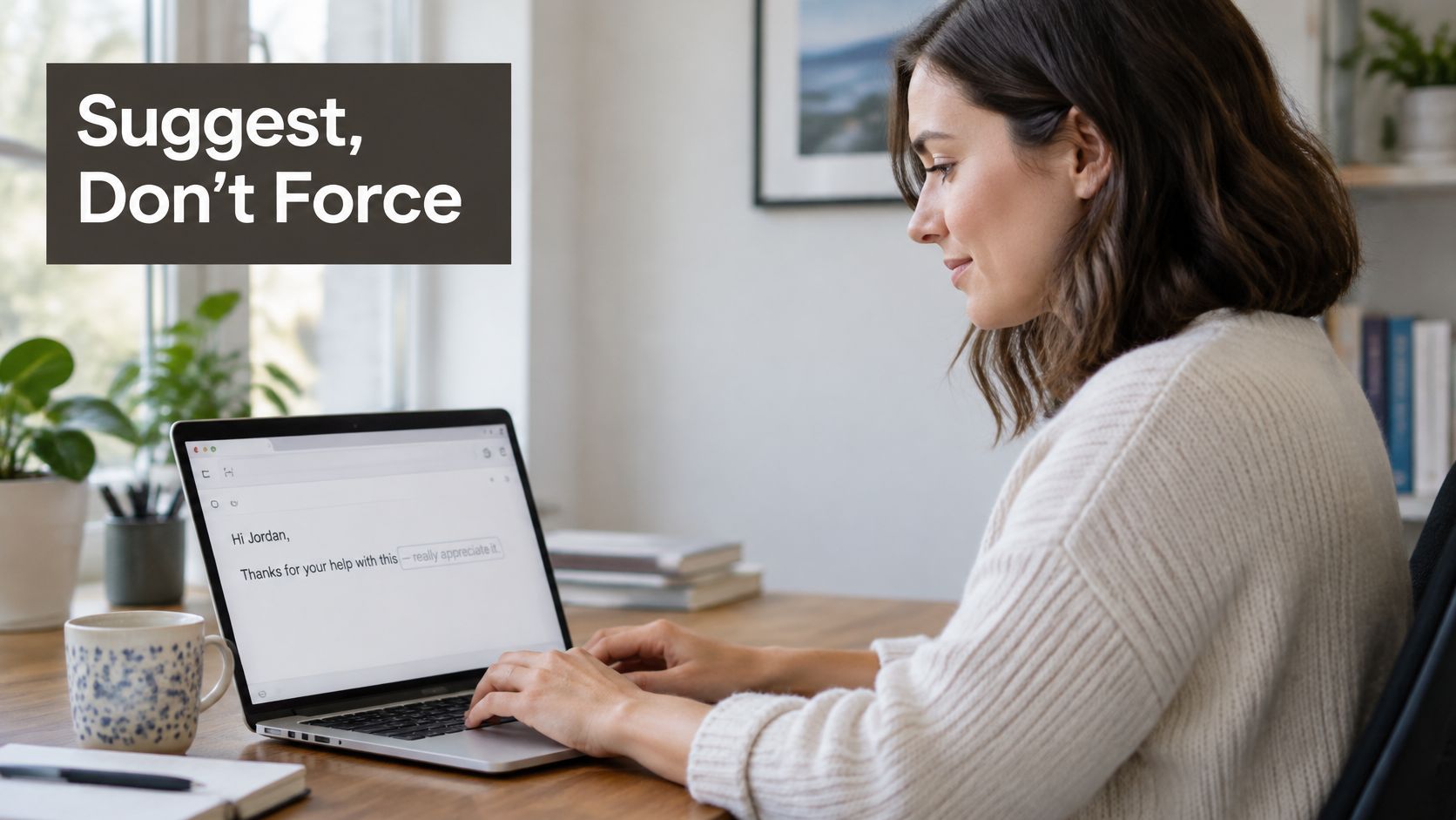 A woman typing on a laptop with an artificial intelligence writing suggestion displayed on the screen.