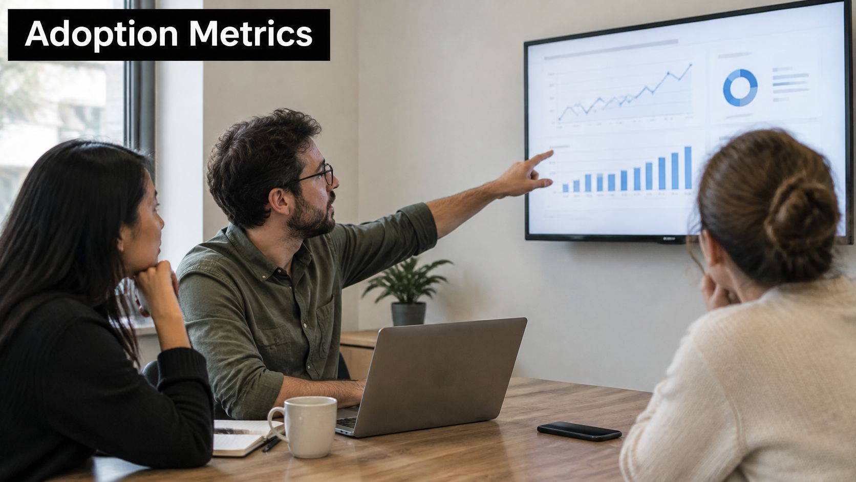 A professional team reviewing business data and analytics on a large screen during a work meeting.