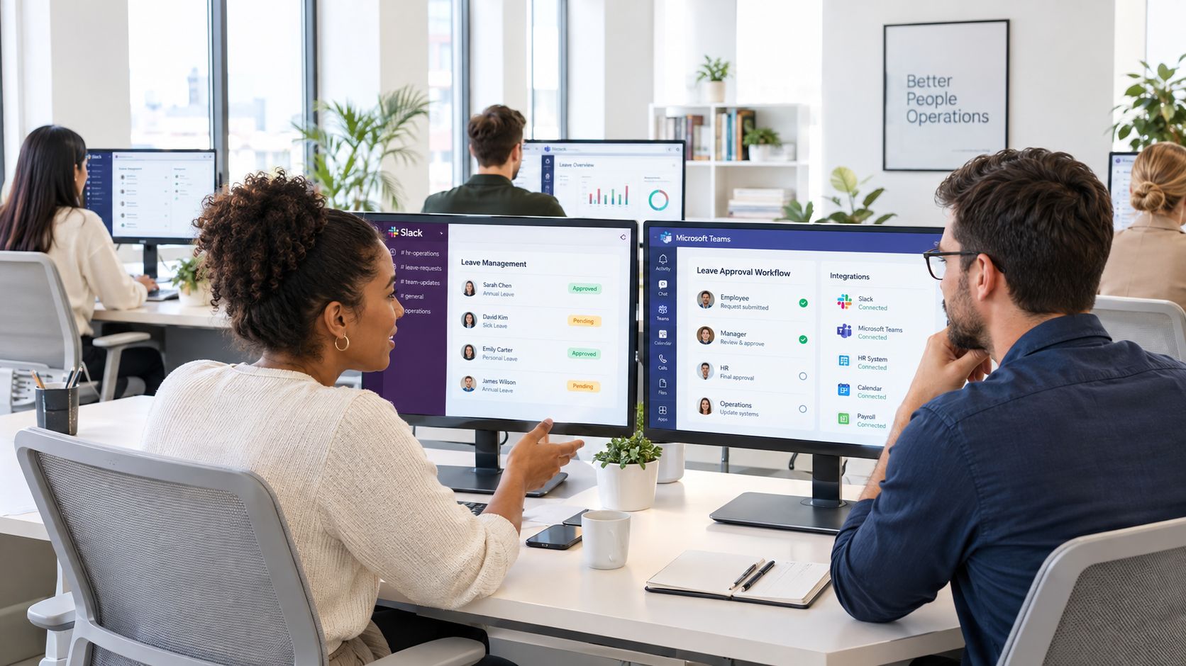 A diverse team collaborating in a modern office, comparing Slack and Microsoft Teams software on computer monitors.