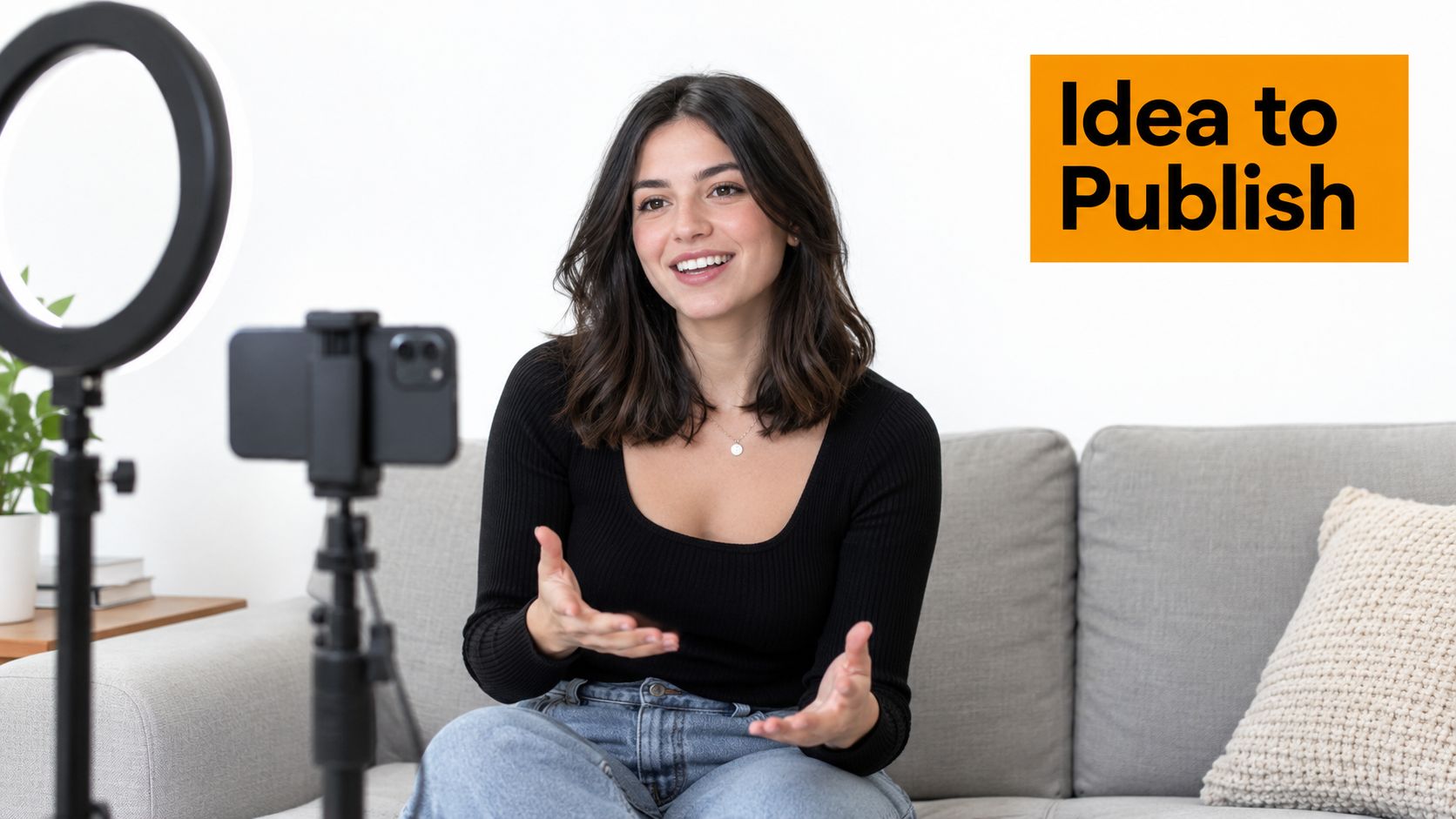 A young woman smiling and gesturing while recording a video on her smartphone with a ring light.