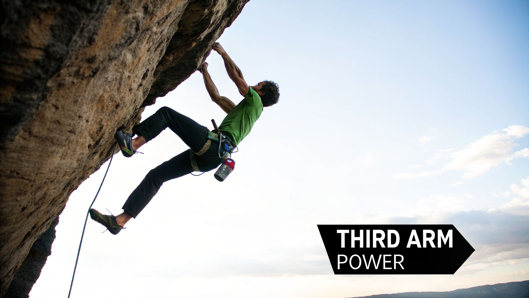 A male climber in a green shirt performing a heel hook on an overhang rock face.