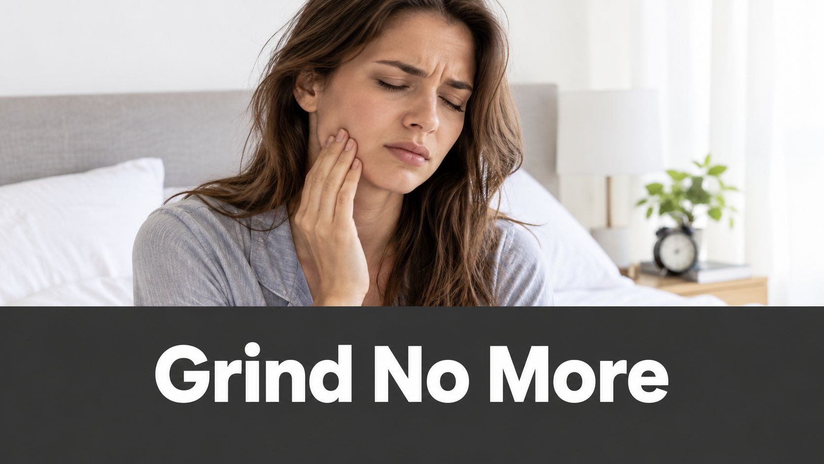 A woman holding her jaw in pain, illustrating the concept of teeth grinding or bruxism relief.