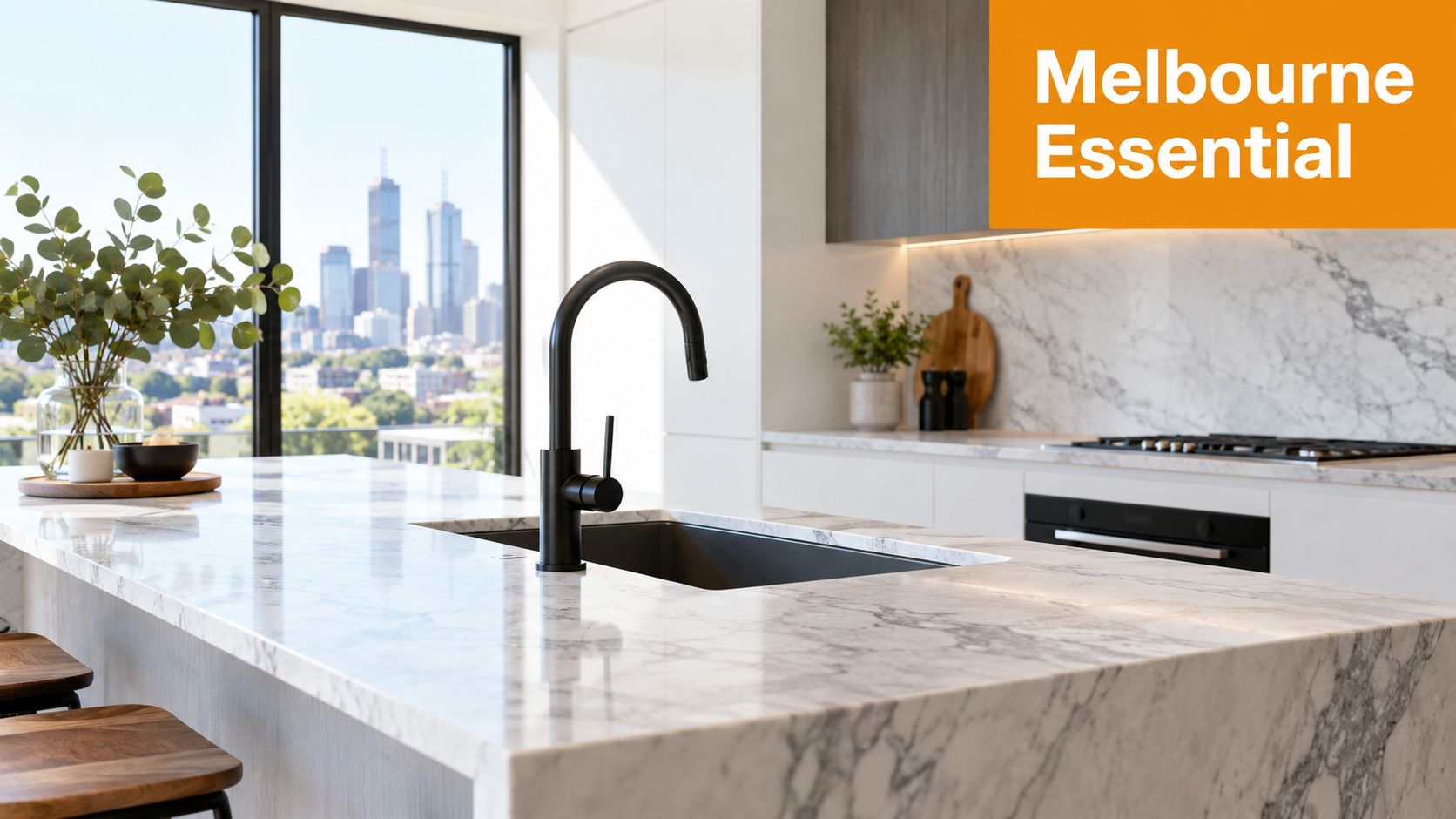 A modern kitchen island with a marble countertop, black faucet, and a view of the city skyline.