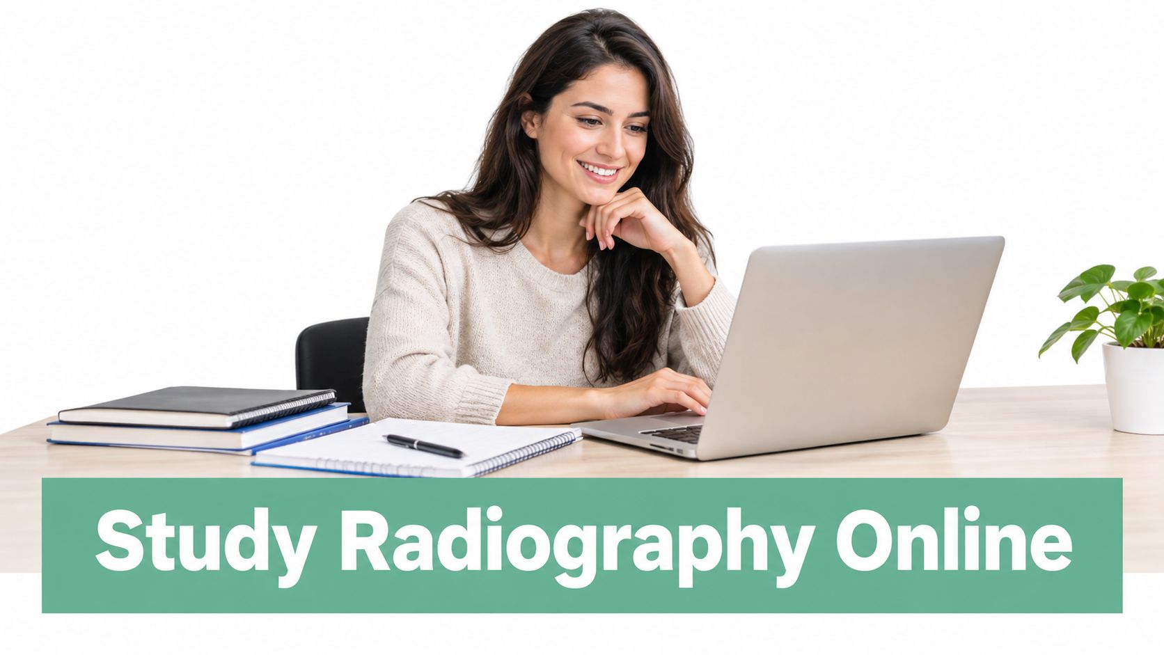 A smiling young woman sitting at a desk and studying radiography online using a laptop computer.