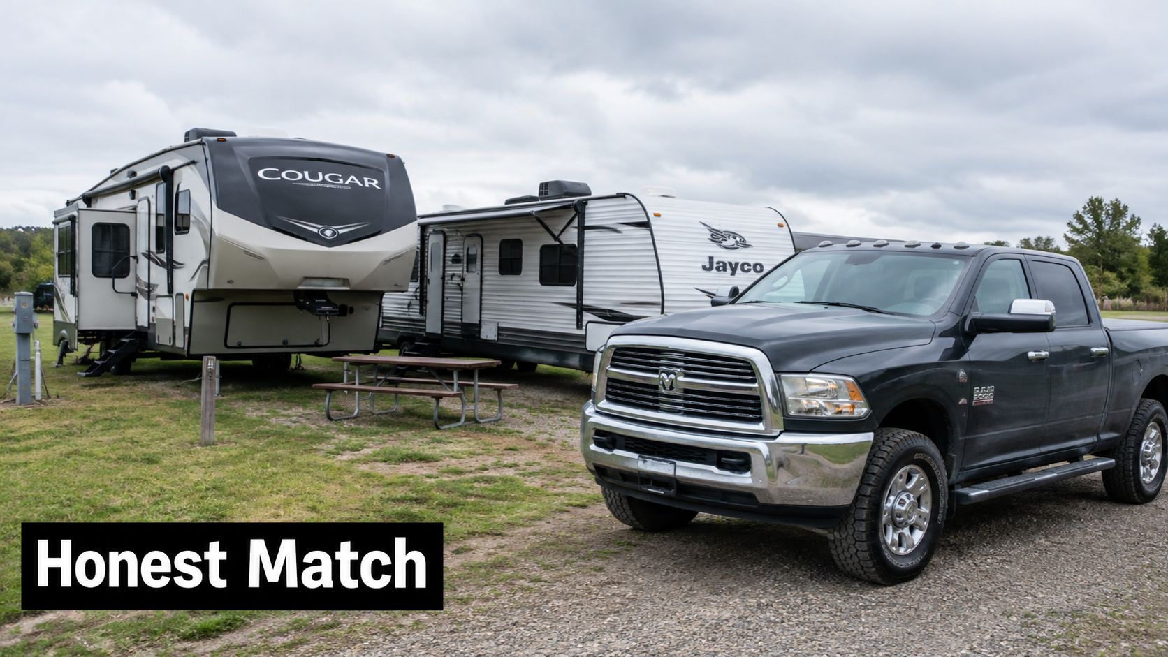 A black Ram truck parked next to a white Jayco travel trailer and a Cougar fifth wheel RV.