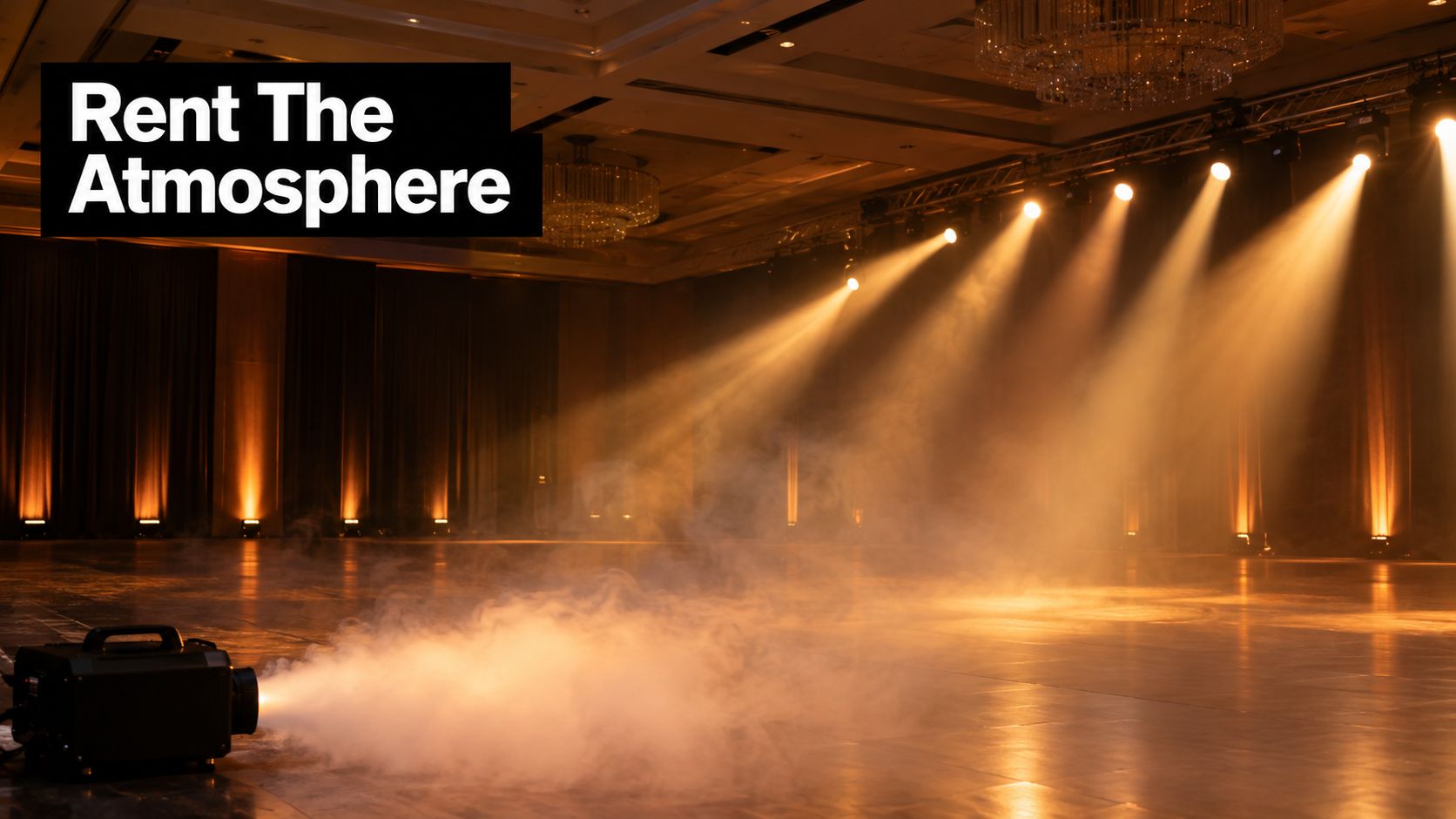 A professional fog machine operating on a dark event stage with dramatic beams of stage lighting.