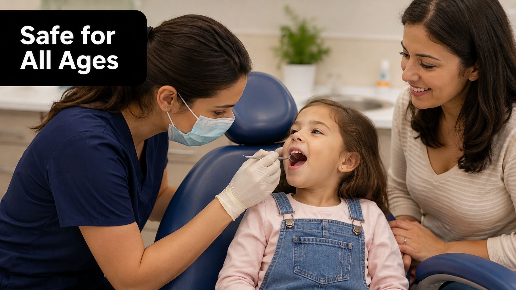 A young girl has a dental exam while her mother watches in a professional dental clinic.