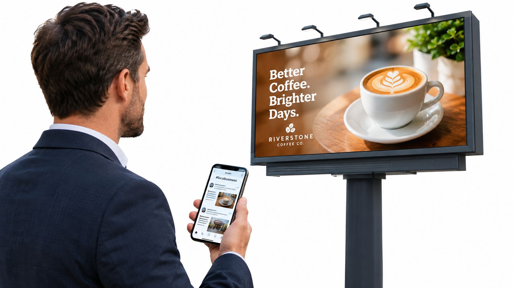 A man in a suit looking at his smartphone while standing in front of a coffee billboard.