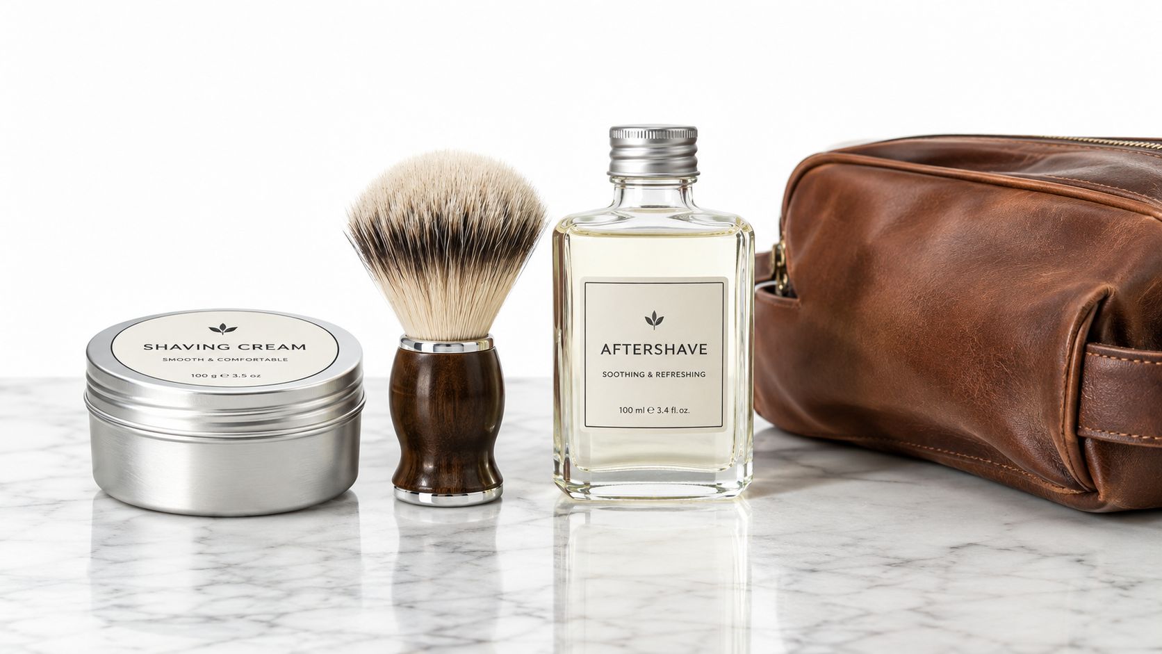 A professional shaving kit for men featuring shaving cream, a brush, aftershave, and a leather toiletry bag.