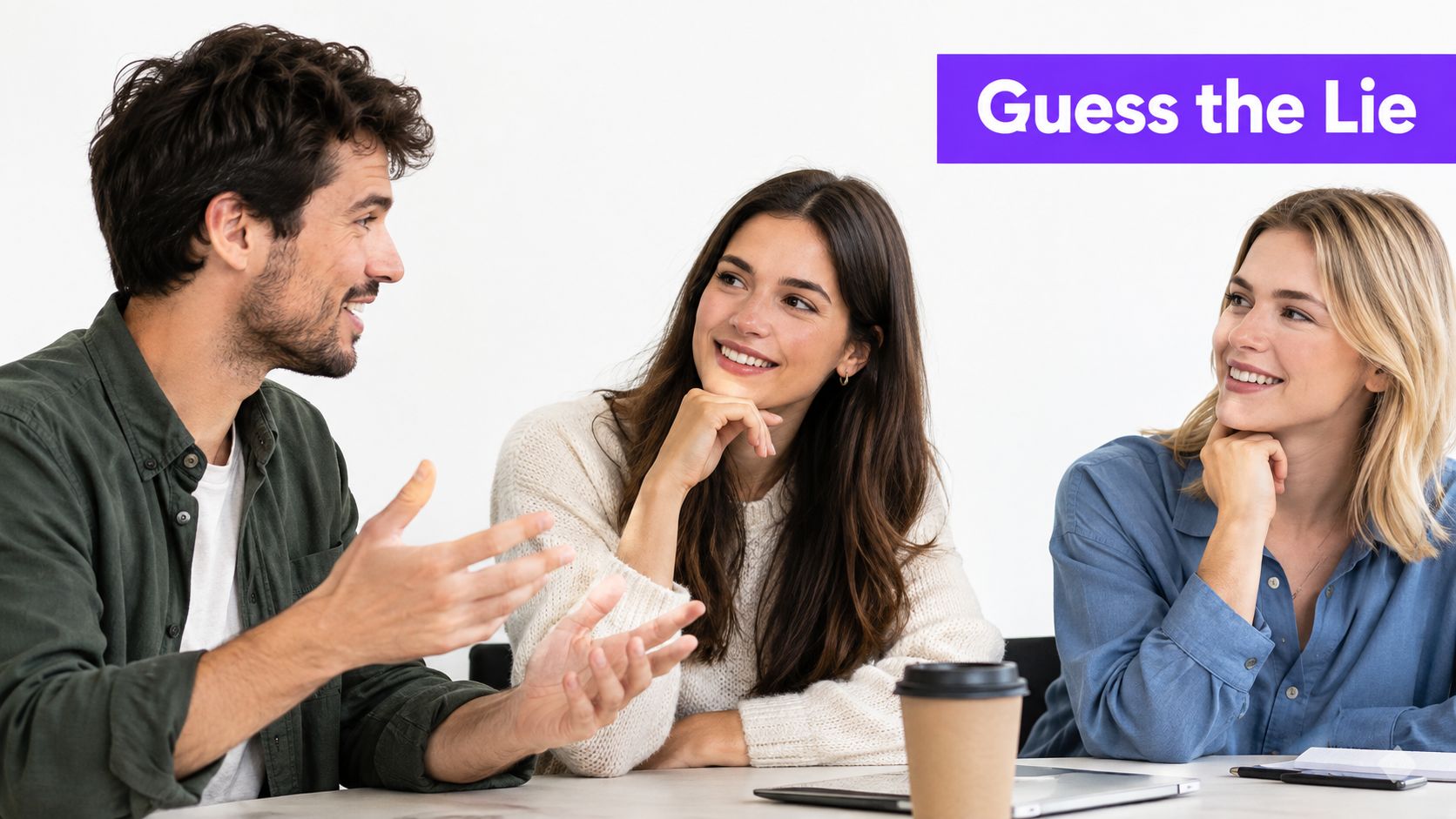 Three colleagues sitting together at a table engaged in a friendly conversation during a meeting.