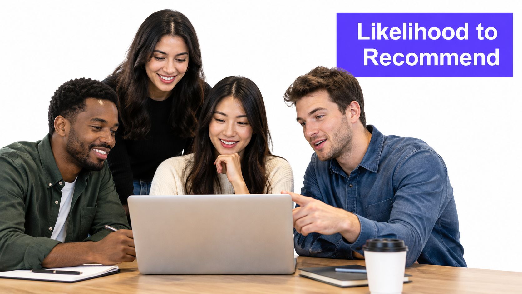 A diverse team of four young professionals collaborate and discuss feedback on a laptop during a meeting.