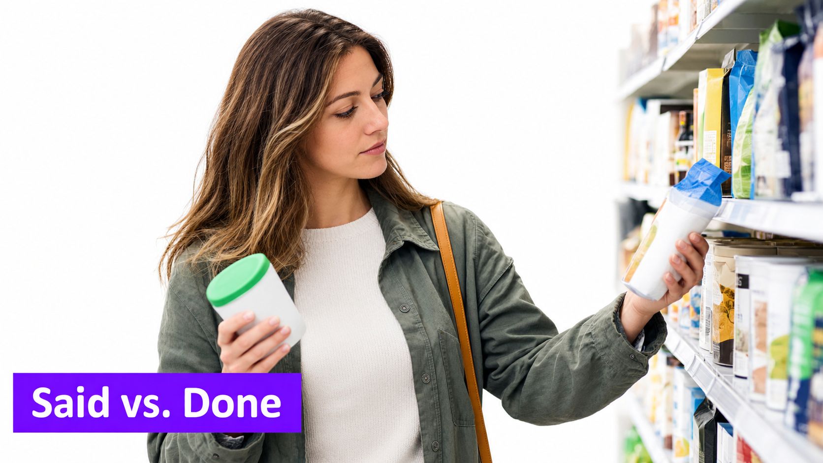 A focused woman compares product labels while shopping in a grocery store aisle for market research.